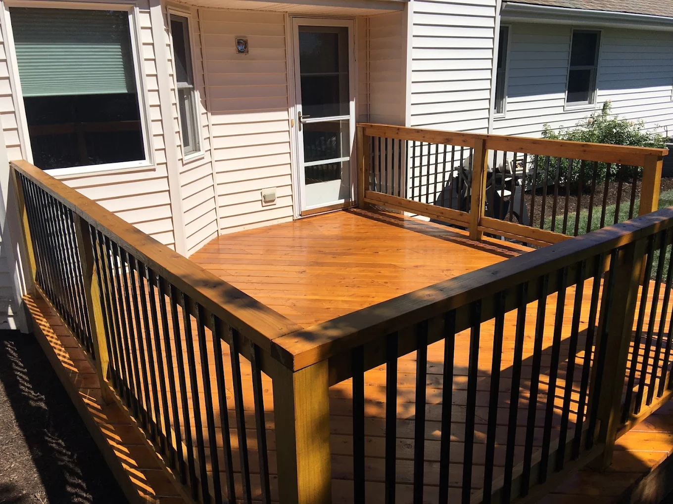 Weathered deck showing signs it needs restoration in SE Wisconsin